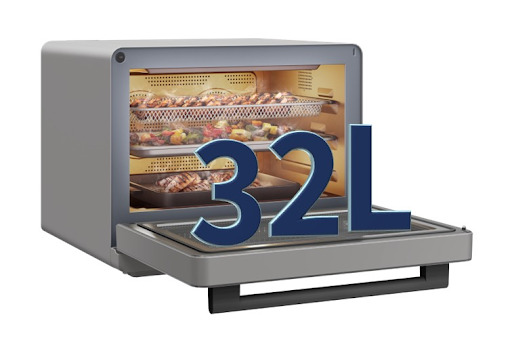 A 32-liter large capacity multi-function countertop oven with its door open, showing three full racks of food cooking inside.