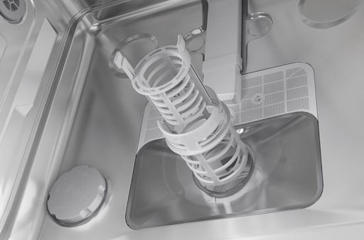 Dirty dishwasher filter being cleaned to improve water circulation, cleaning results, and dish drying performance